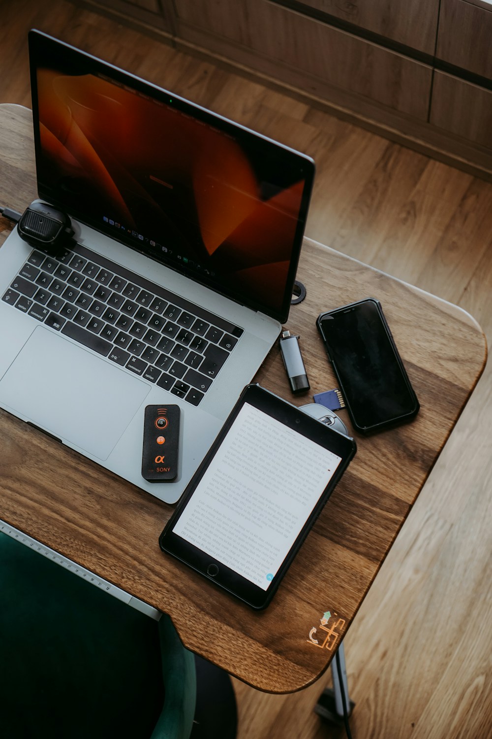 Laptop, tablet and phone on a desk
